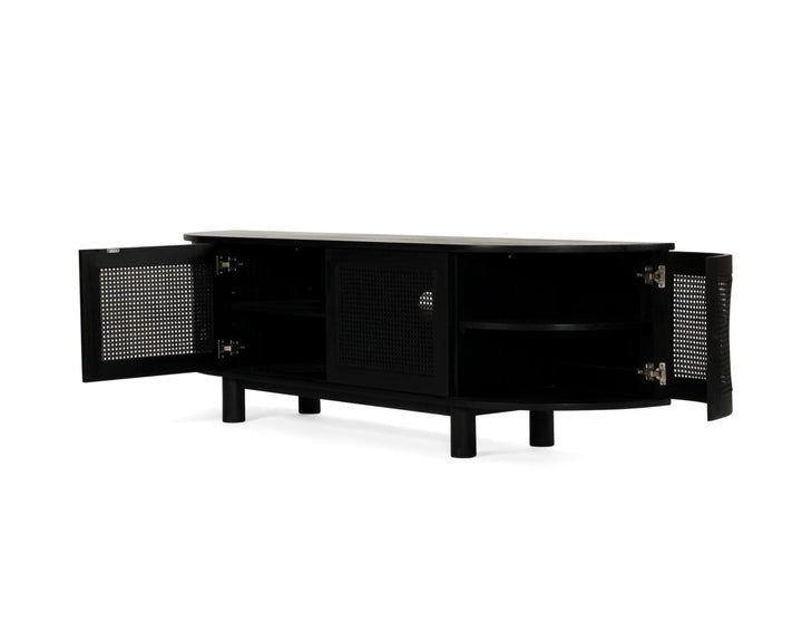 A black media console cabinet with two doors swung open, featuring rattan mesh doors, set against a plain white background.