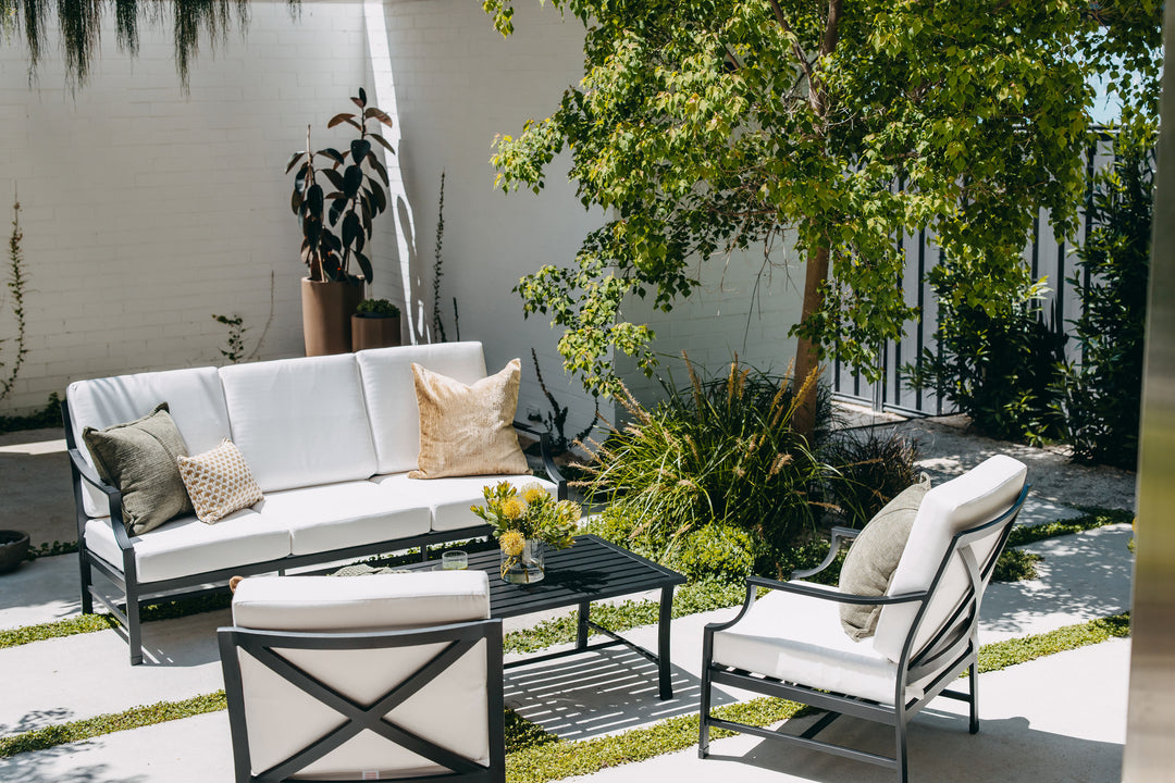 Portofino Lounge Set in Black styled in the sun. 