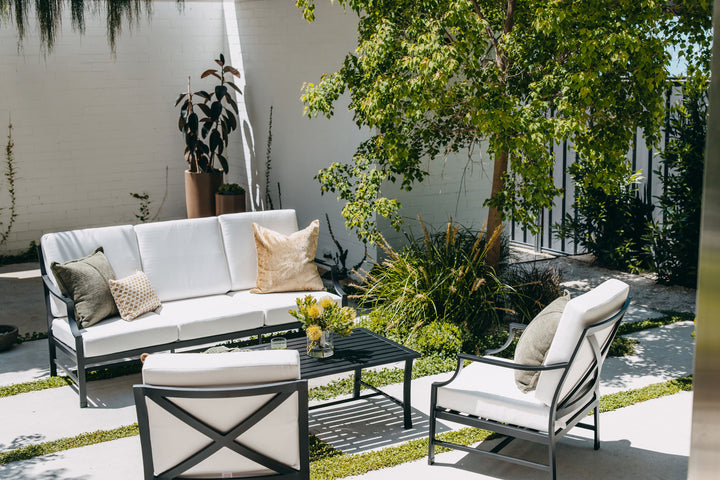 Portofino Lounge Set in Black styled in the sun. 