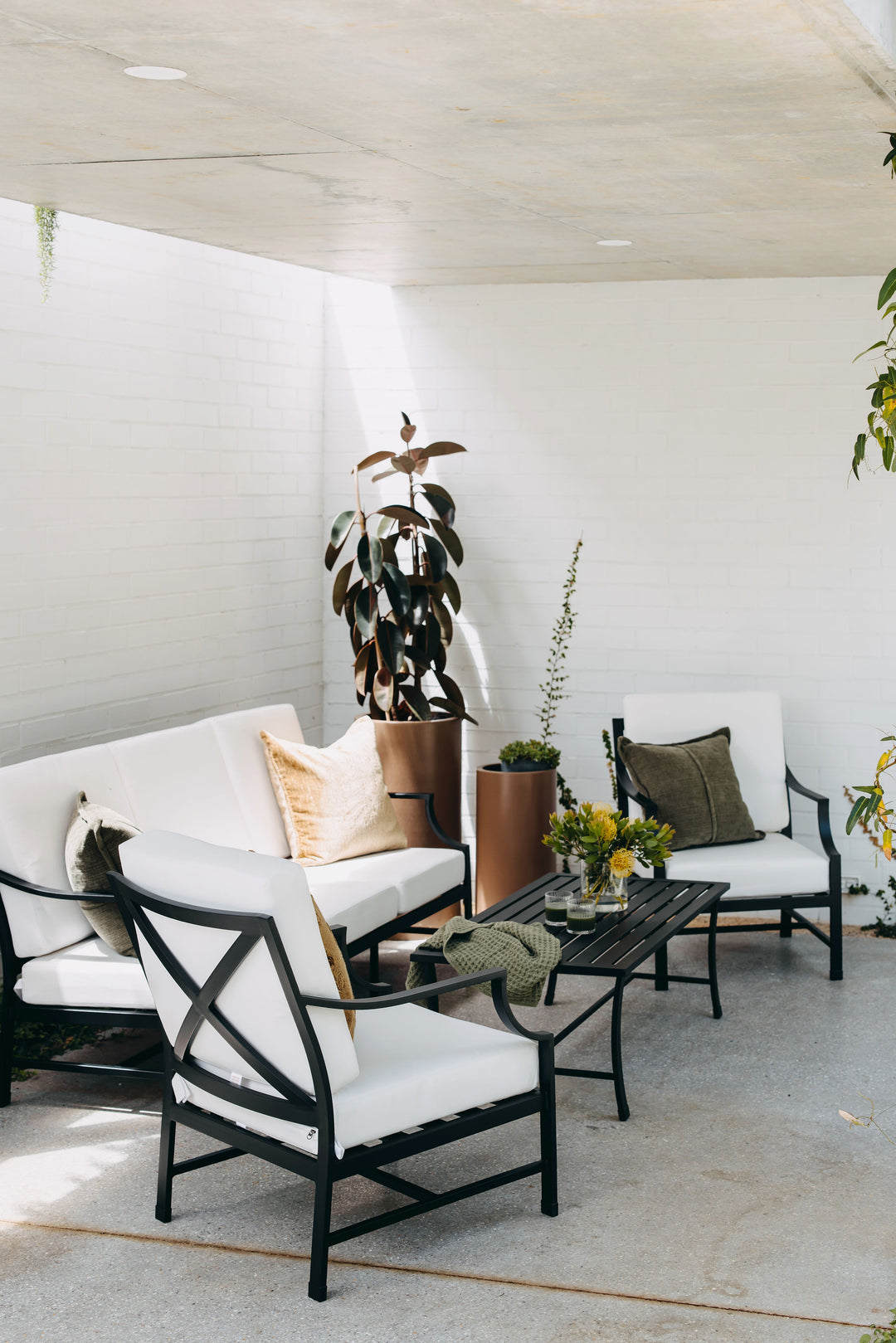 Portofino Outdoor Lounge Set showing cross-back design and scooped arms