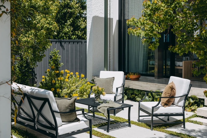 Portofino lounge armchair in powder-coated black aluminium with Sunbrella® cushion