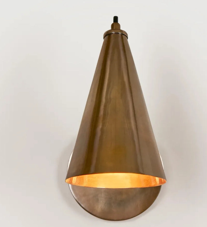 Lumen Sconce in Antique Brass