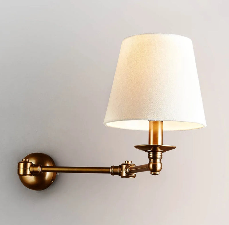 Cape Sconce in Antique Brass