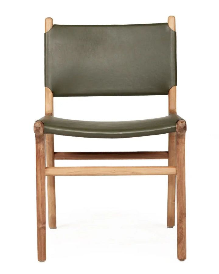A modern teak frame dining chair with olive dyed leather seat and backrest.