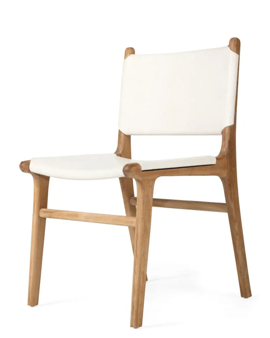 A modern Sutton Leather Dining Chair with a white cushion, teak wooden frame, and white leather upholstery.