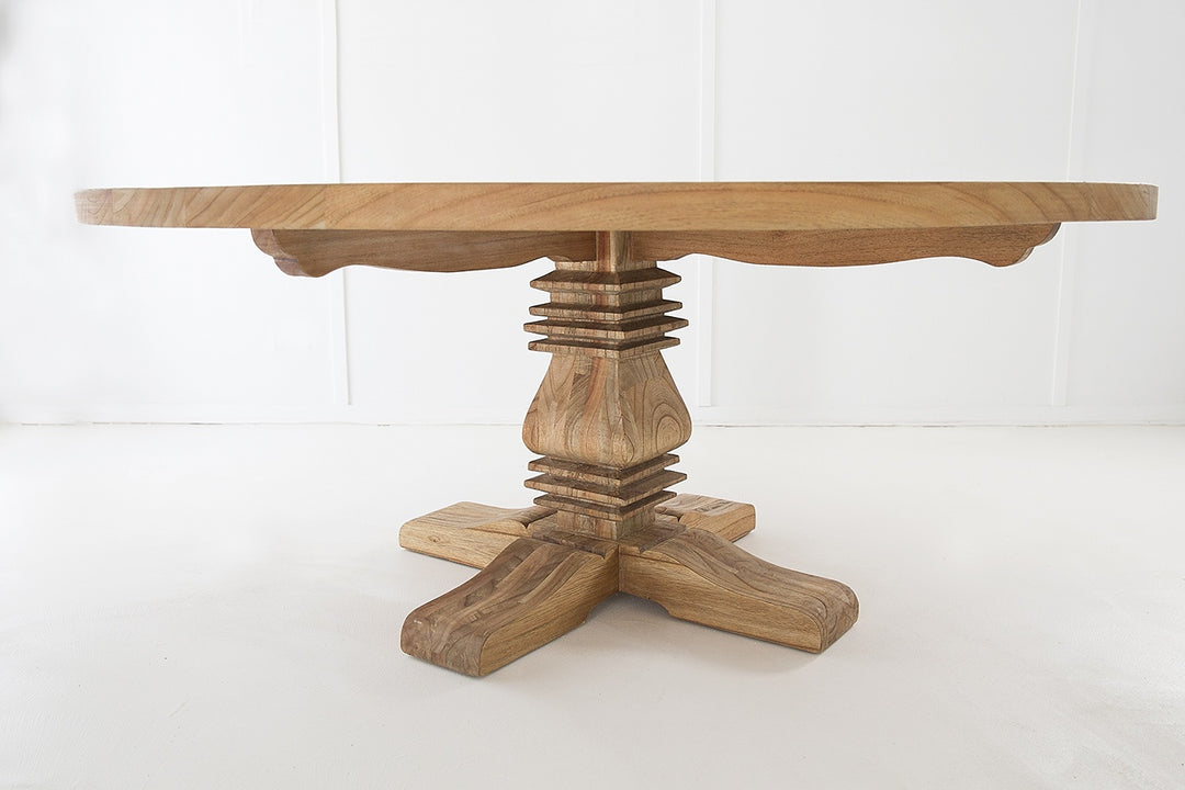 Grayson Round Pedestal Dining Table showing the base of table